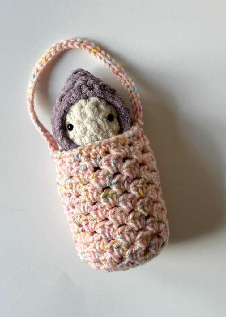 Dottie Doll in her bag