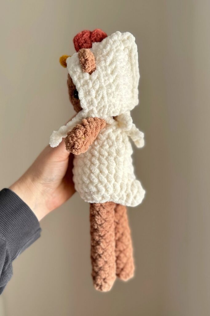 Photos showing the tail on the chicken outfit completed from the back.