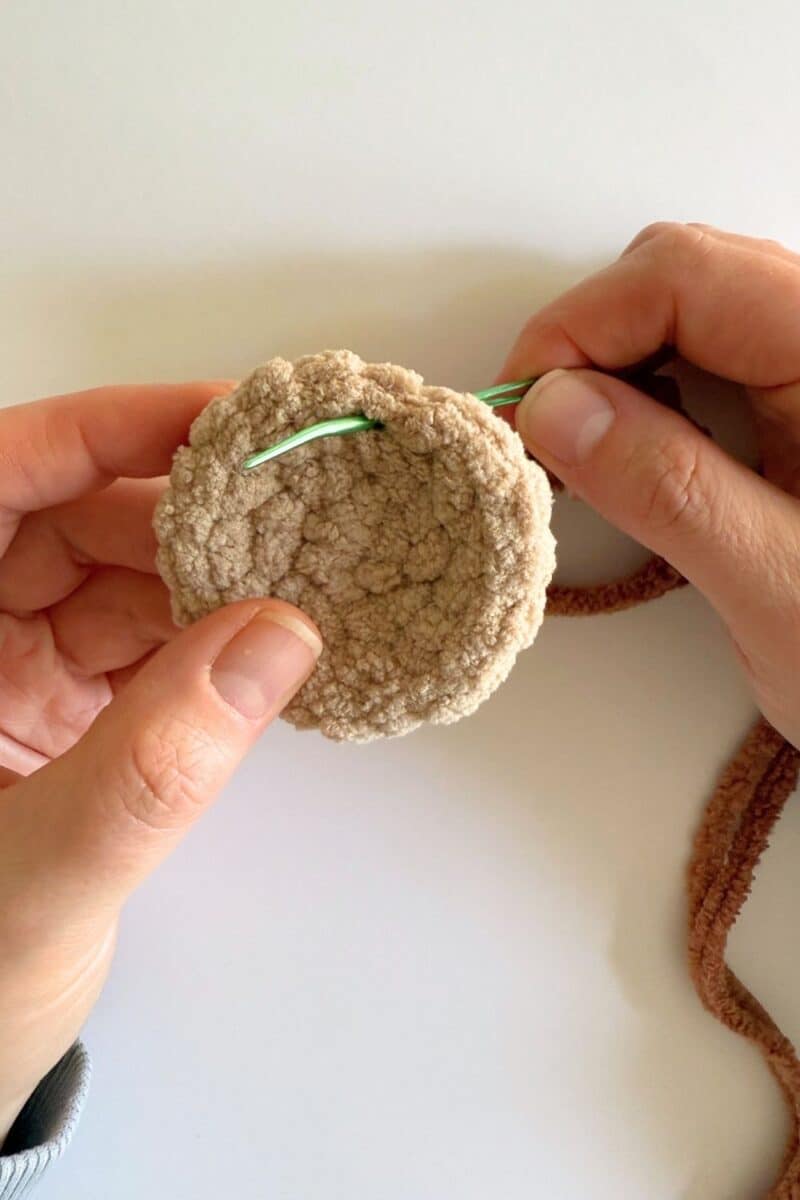 Process photo - adding chocolate chips with yarn.