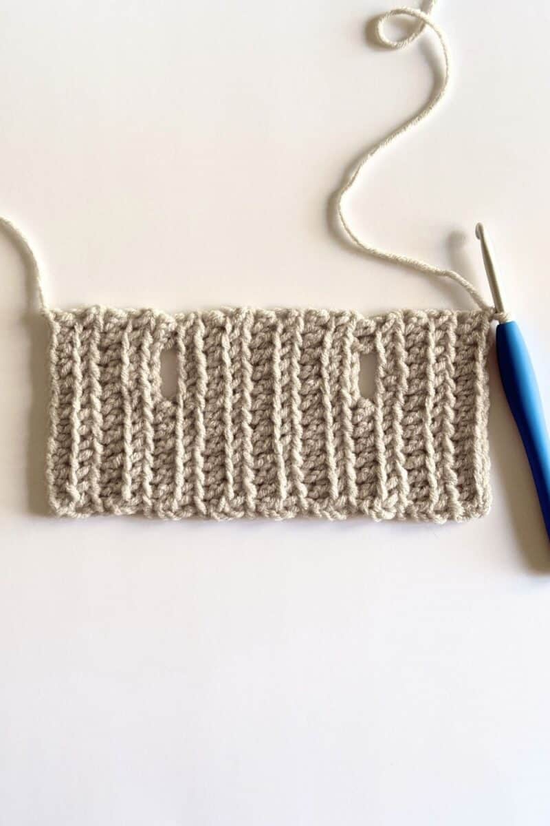 A photo of the finished crochet stitches to complete the fable beanie.