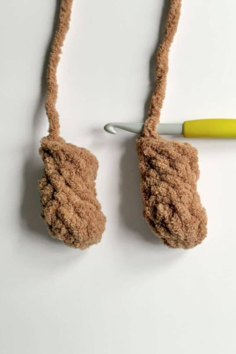 Process photos showing two legs for the Finn Bear assembly.