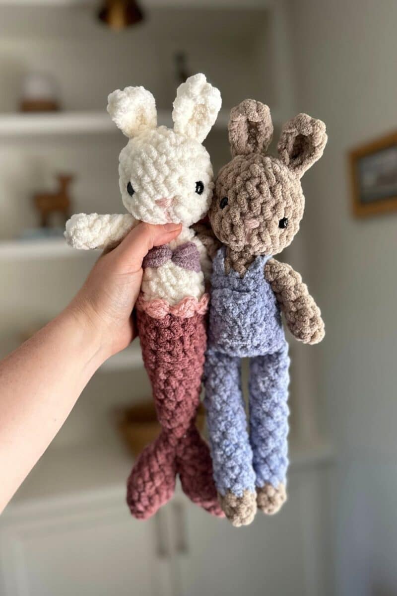 Two crochet bunnies, one has a mermaid tail.