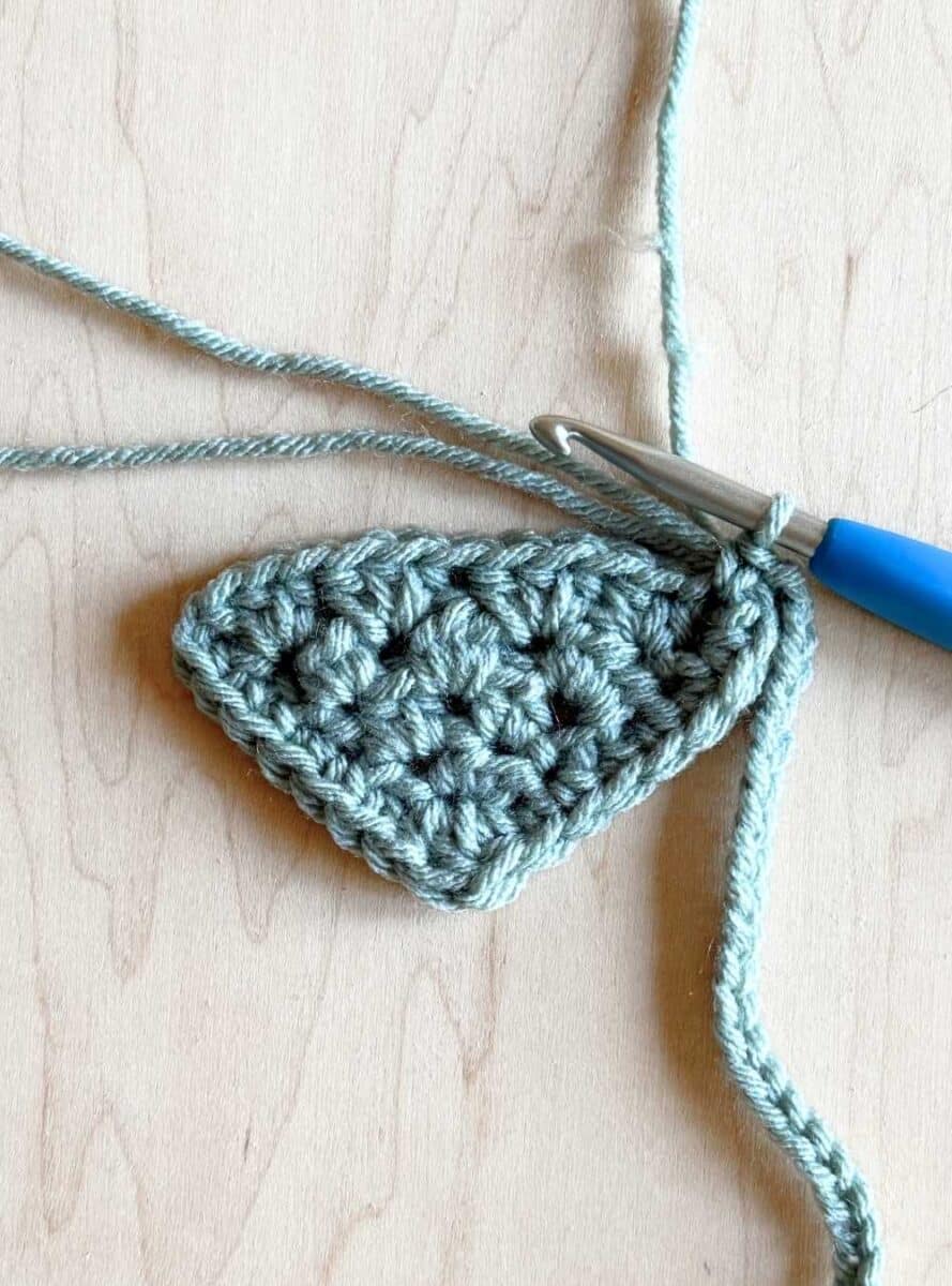 Showing where to work the first stitch when adding the ties.