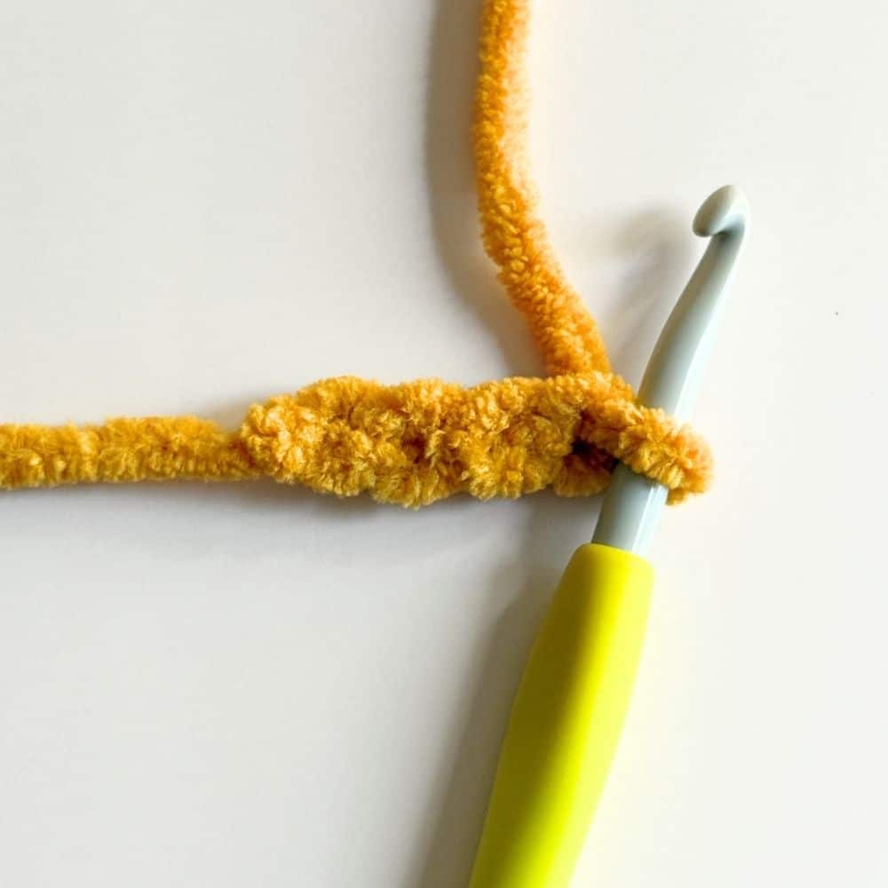 A yellow crochet chain