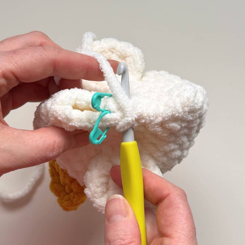 Showing a slip stitch added before starting the head.