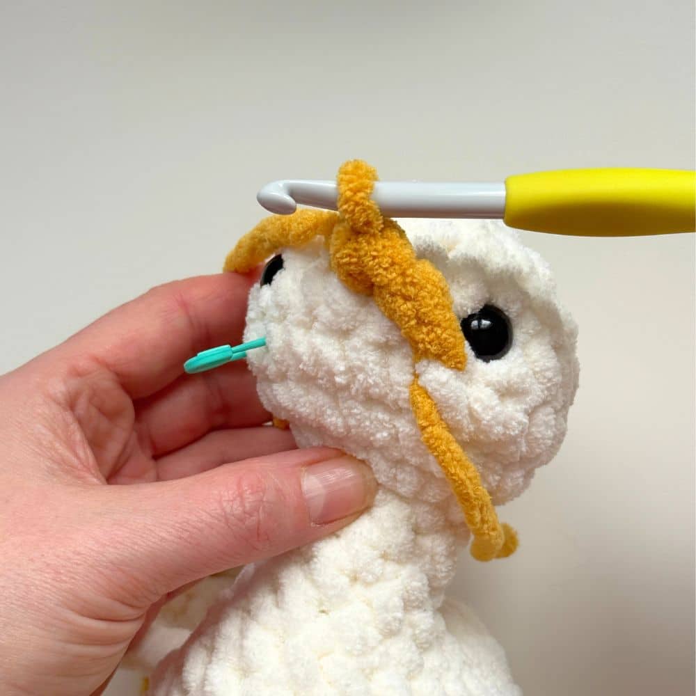 Process photo showing the beak added.