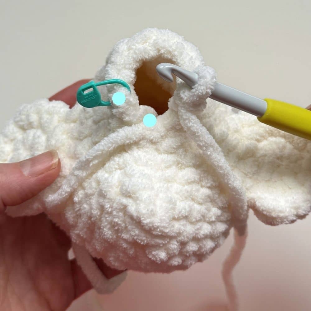 Photo showing spaces where the decrease stitch will be added.