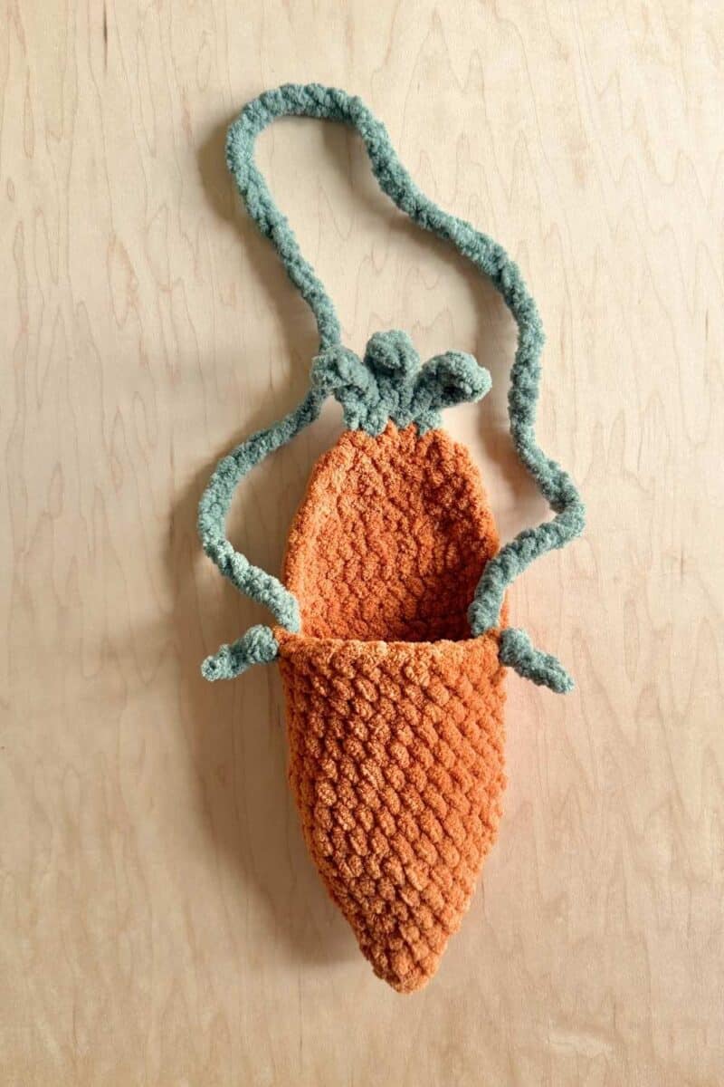 Both straps attached, photo showing finished carrot sachel.
