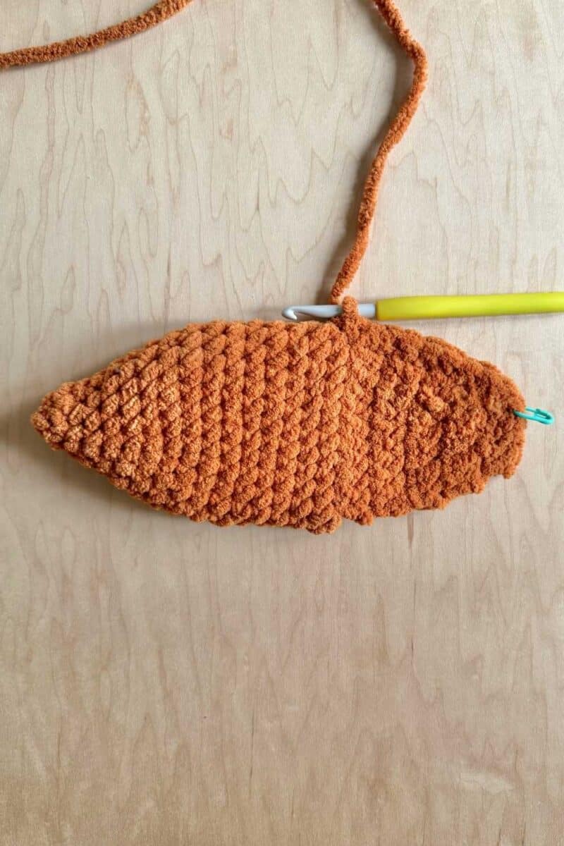 Side/back view of the carrot sleeping bag.