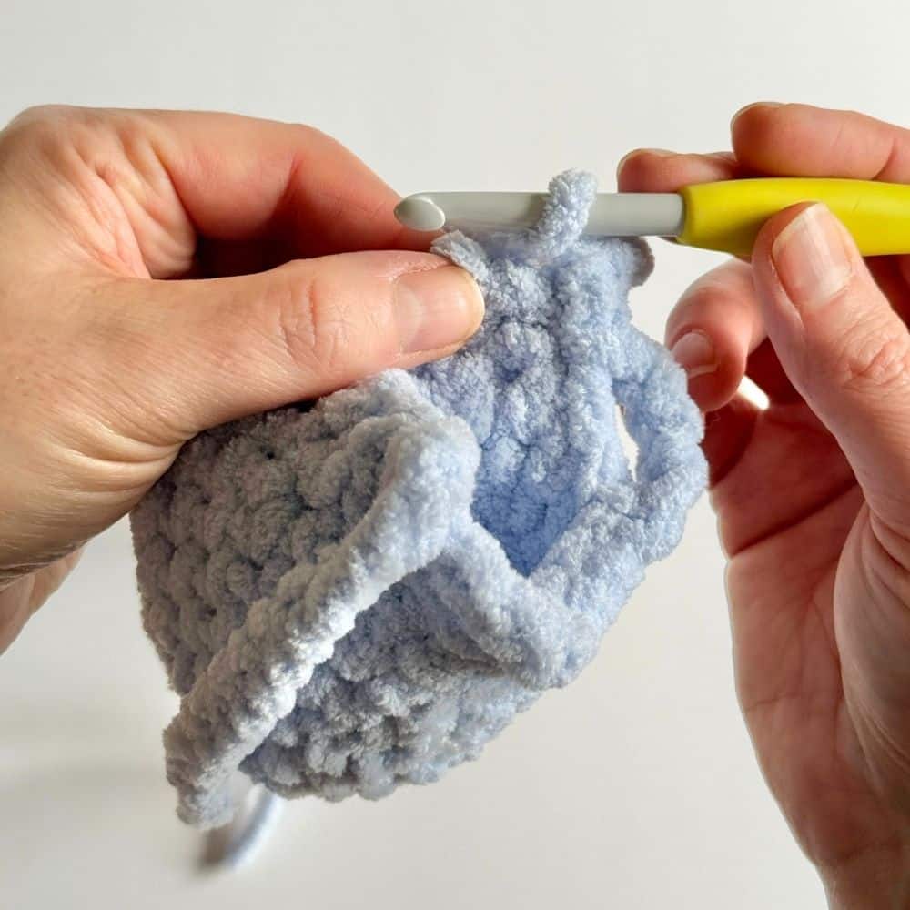 Photo showing steps for finishing off the back of the crochet dress.