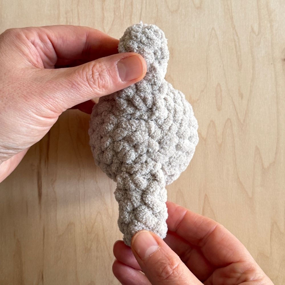Arms attached to Fable Baby head. 