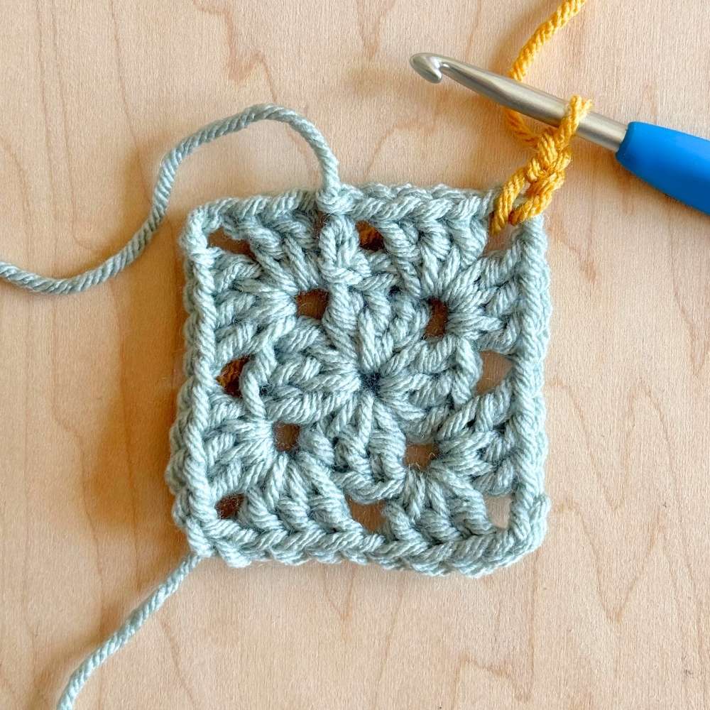 Process photo of 2nd round of blanket with second color added.