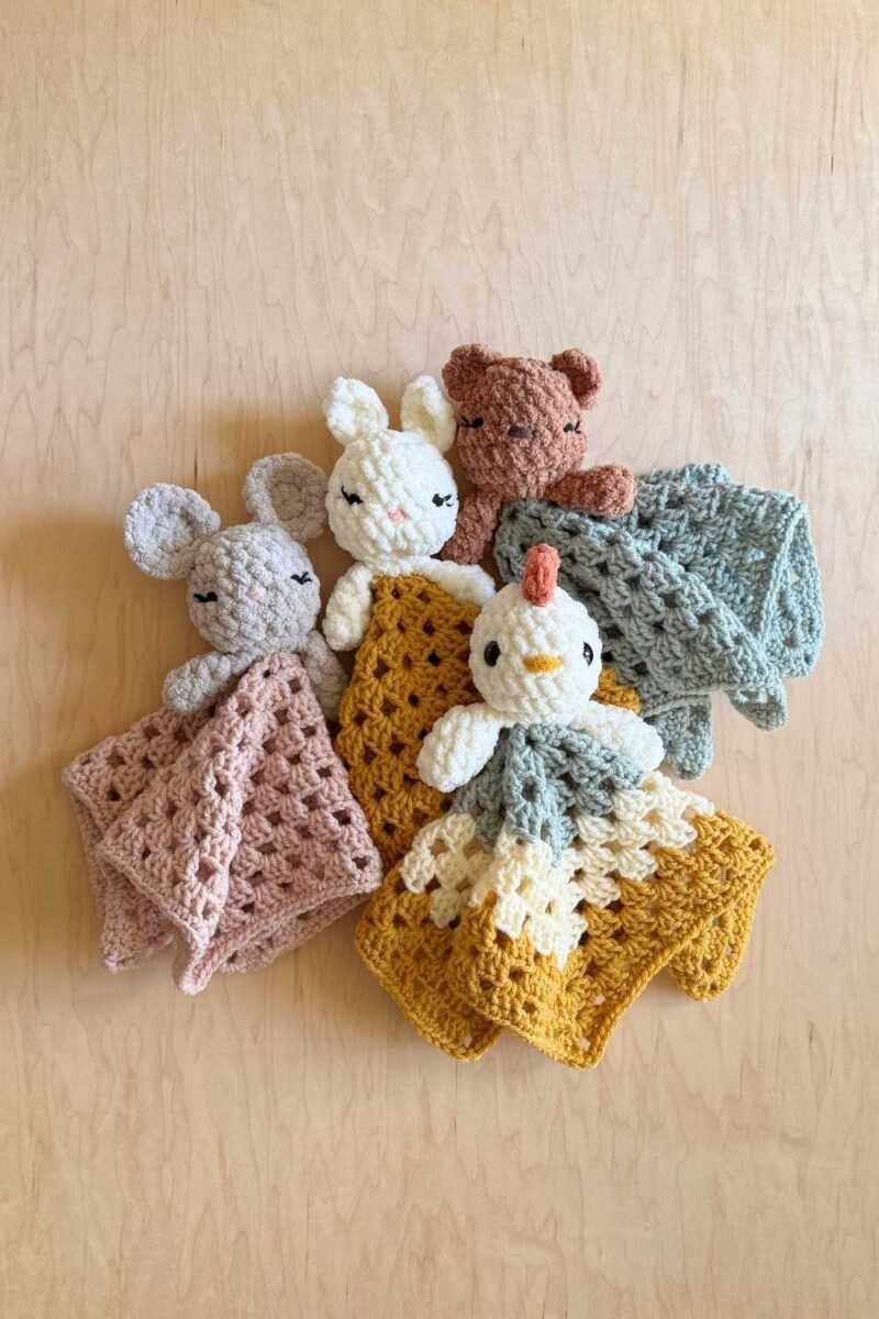 A pile of finished Blanket Babies in all different coordinating colours. 
