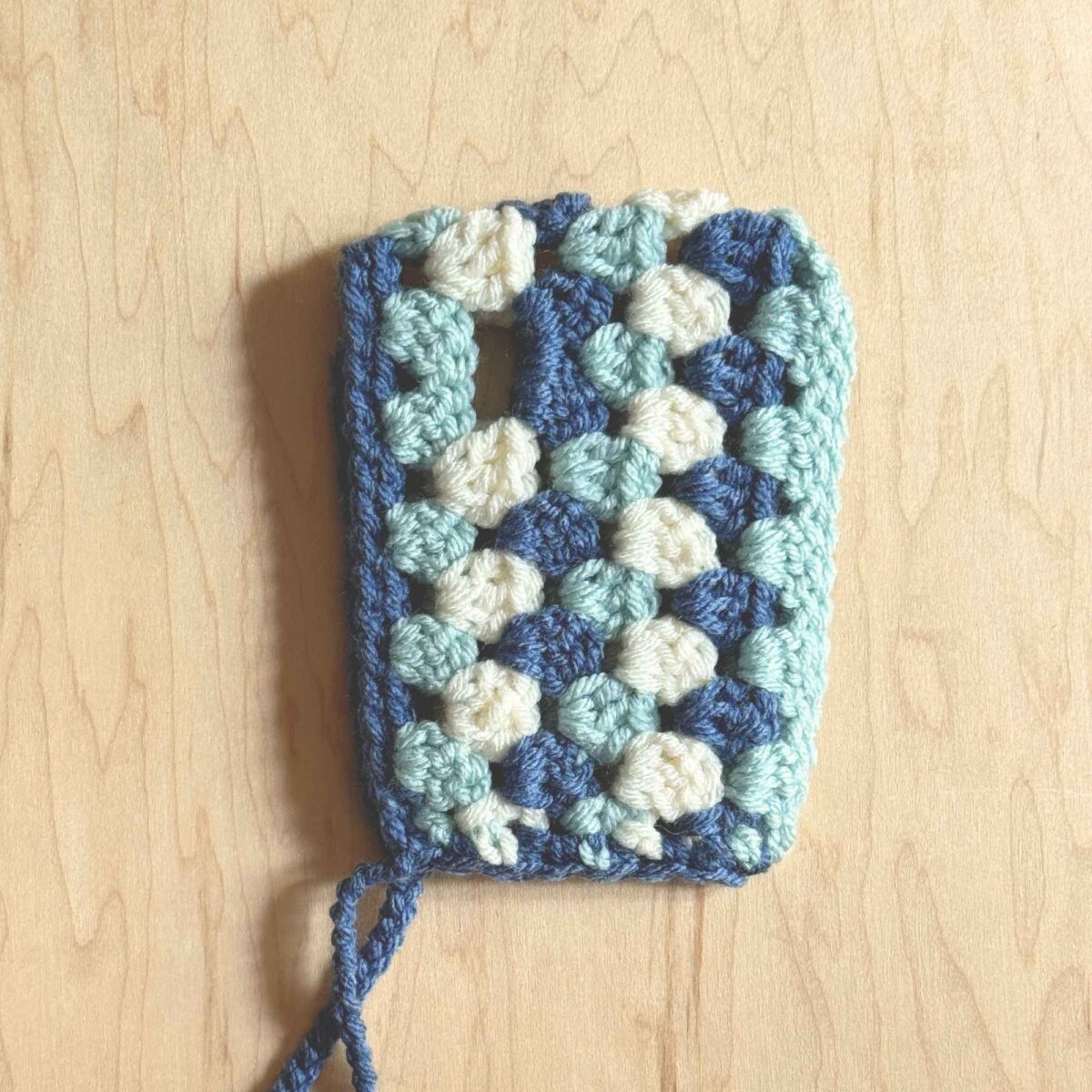 A finished photo of the hat with ties.