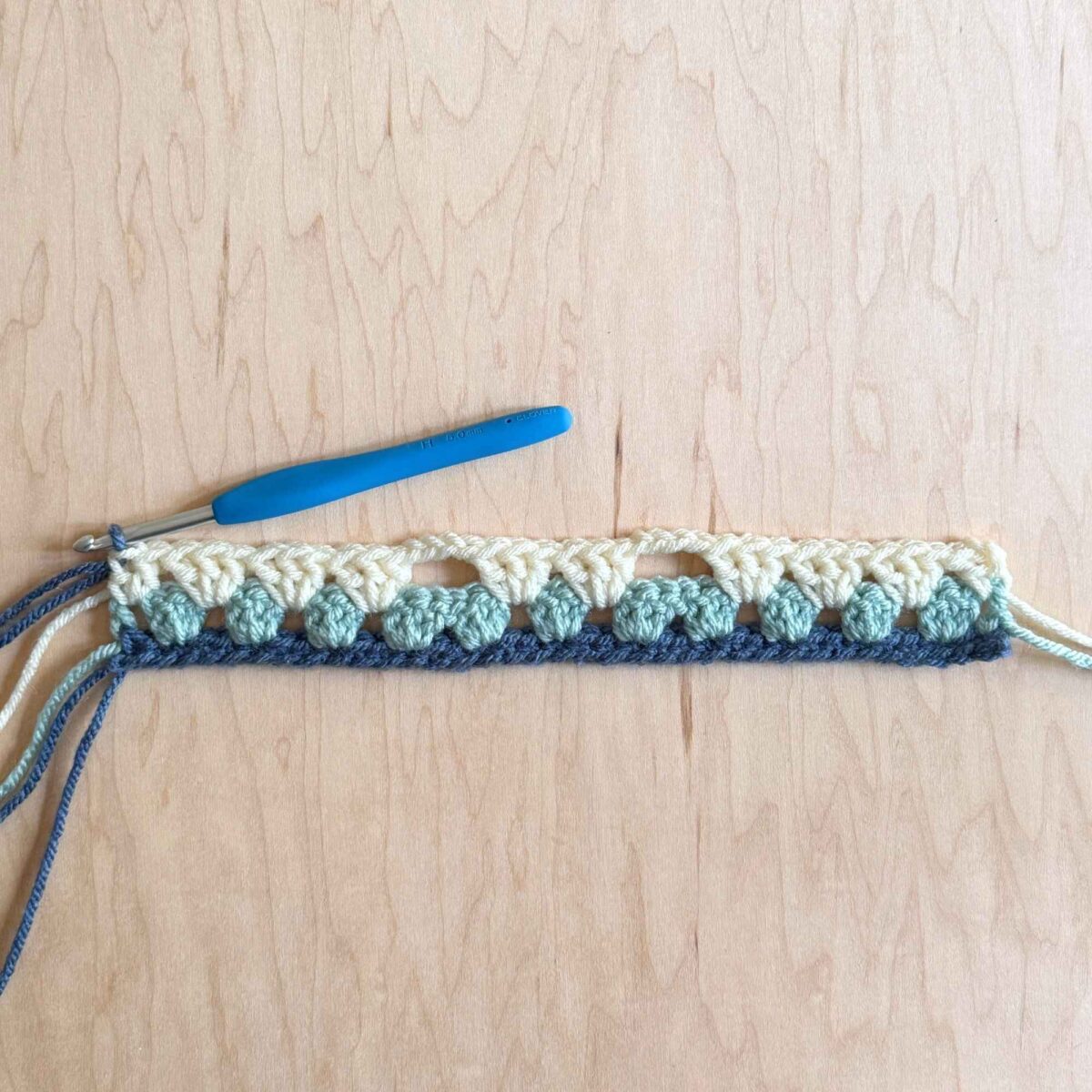 A photo showing row three completed.