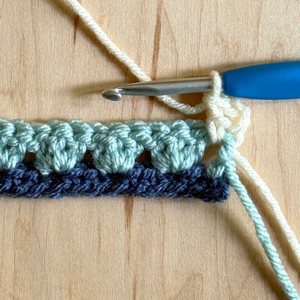 A photo showing the next step for row 3 of the pattern.