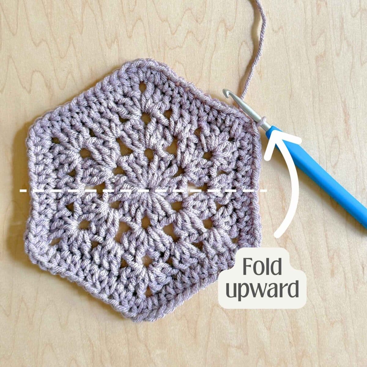 Process photo showing how to fold the hexagon.