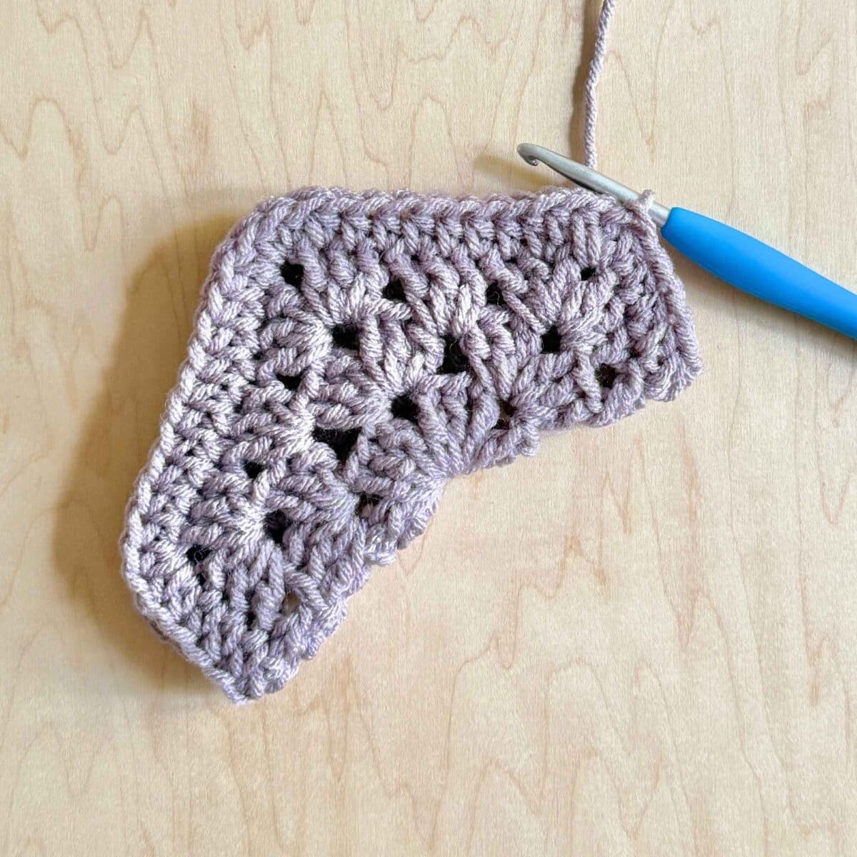 Process photo showing where to stitch on the hexagon.