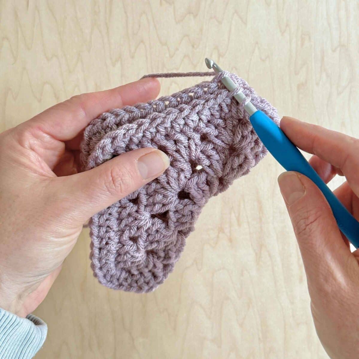 Process photo showing where to stitch on the hexagon.
